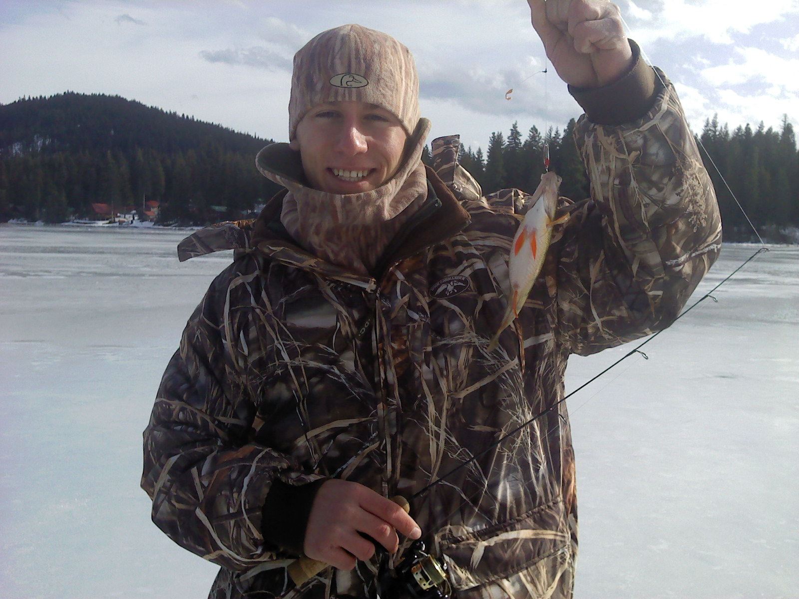 first_fish_with_ice_rod.jpg